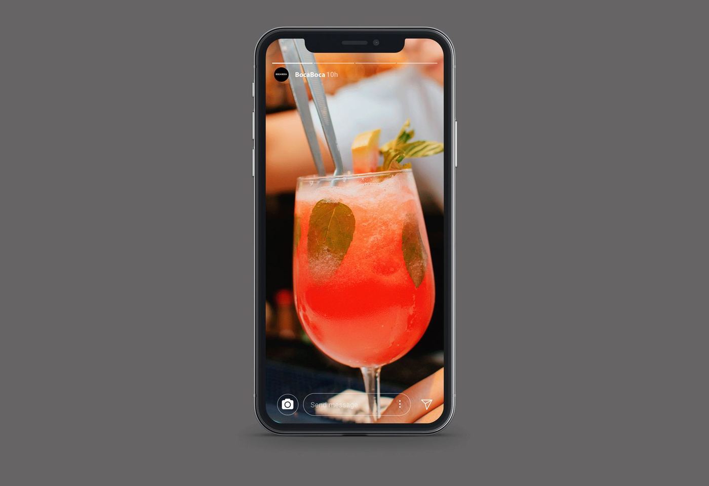 A BocaBoca Instagram story on a phone: a red cocktail with mint and a straw