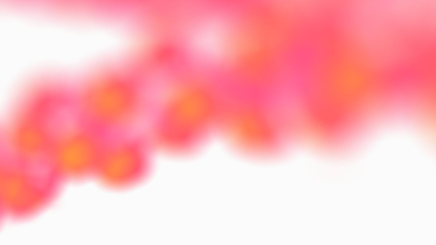 A wide blurred band of pink and orange petals