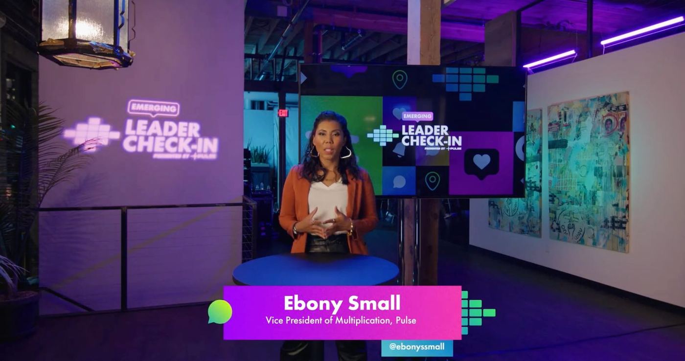 Host on set with an Emerging Leader Check-In lower third
