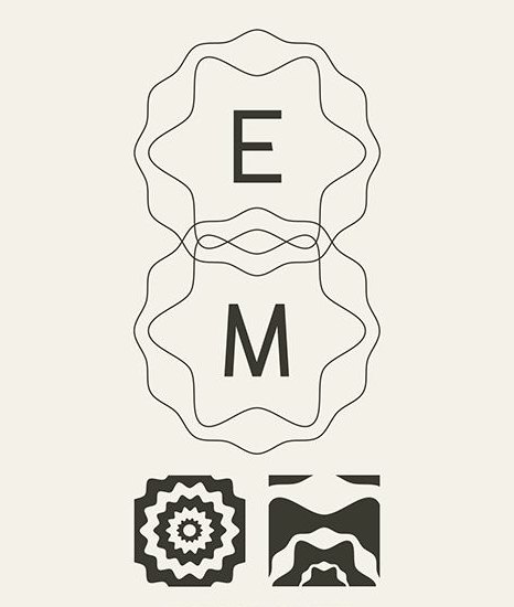The symbol and palette carried onto packaging, stationery, totes and apparel.