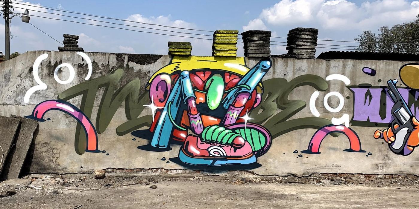 The identity comes out of the culture it serves: graffiti, painted on site.