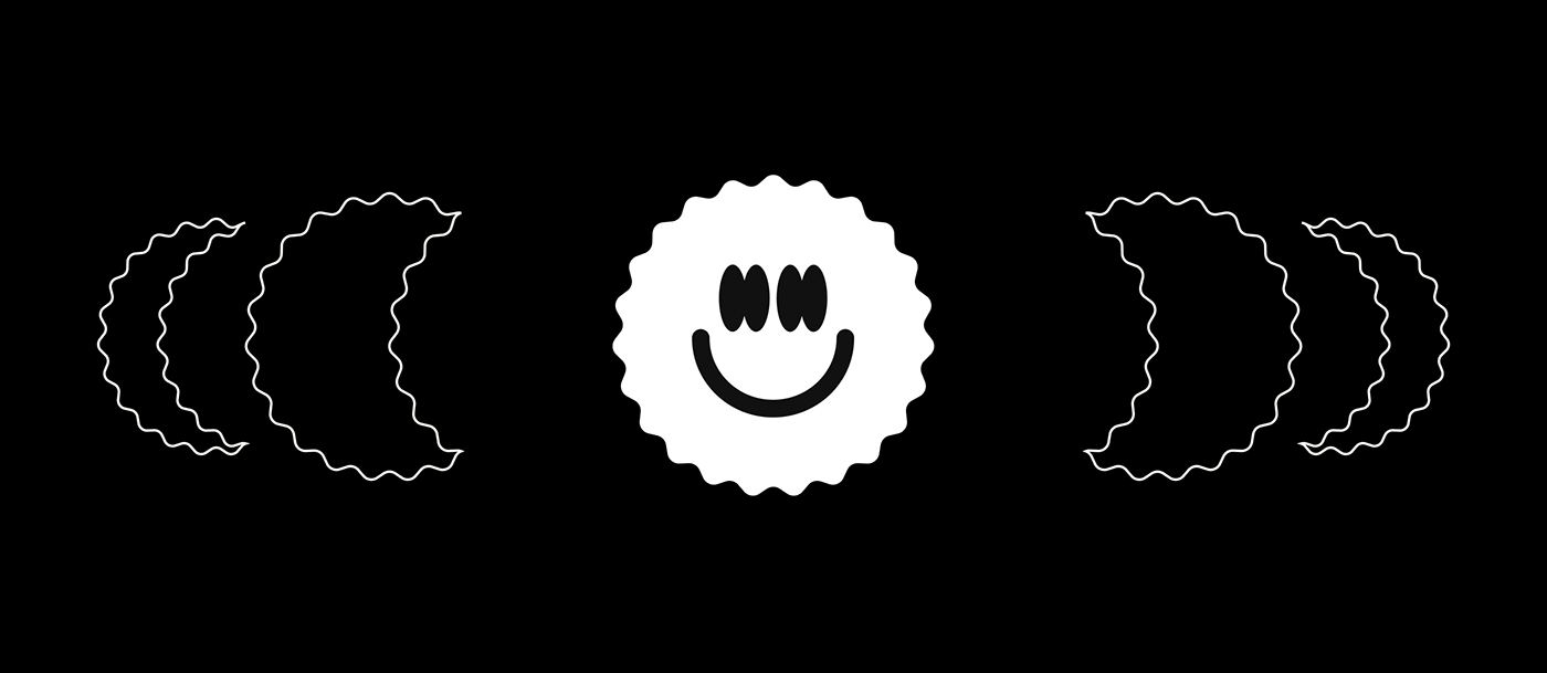 The smile badge, the scalloped coaster and the glass, out in the world.