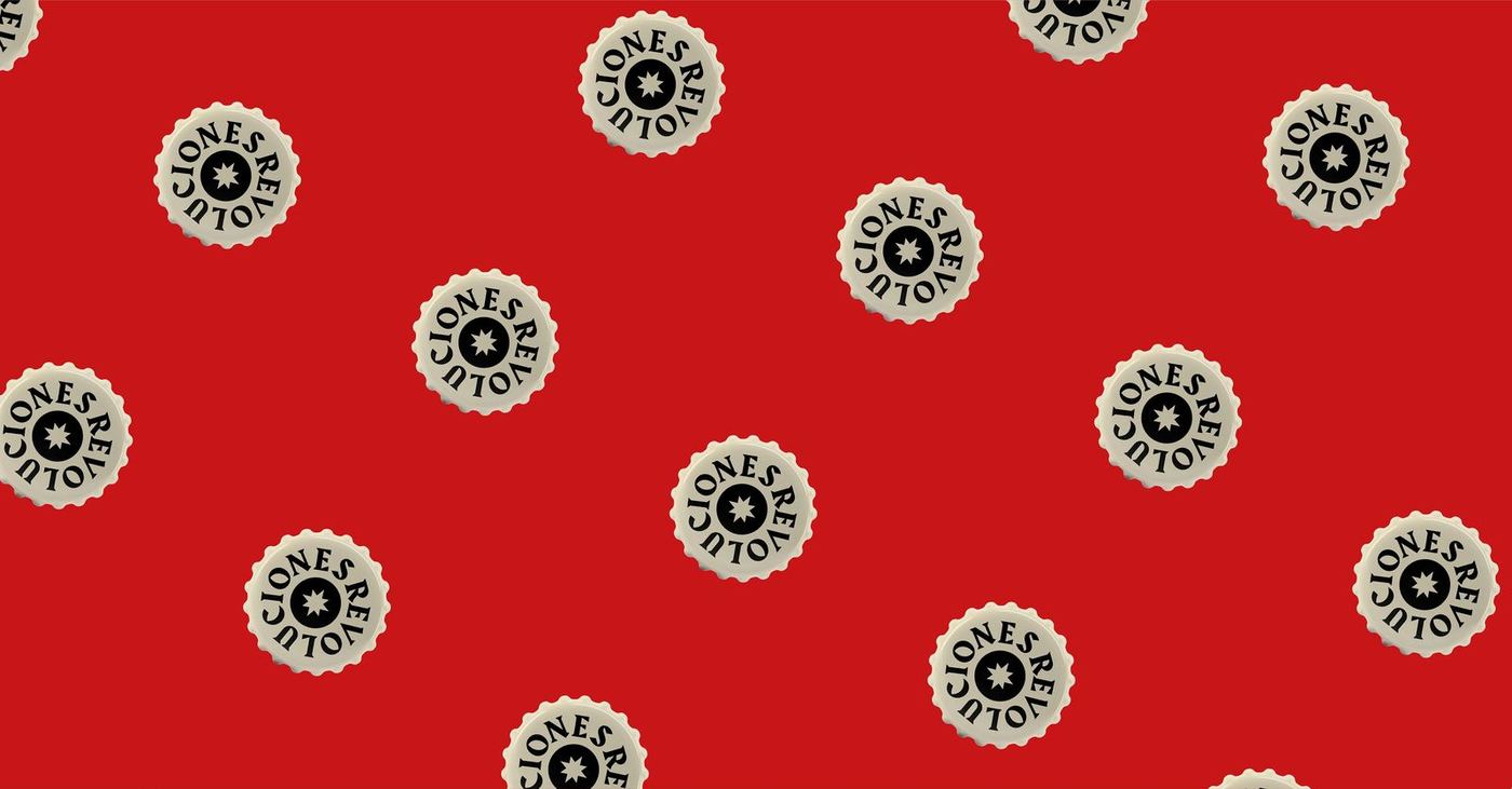 Revoluciones bottle caps scattered on red