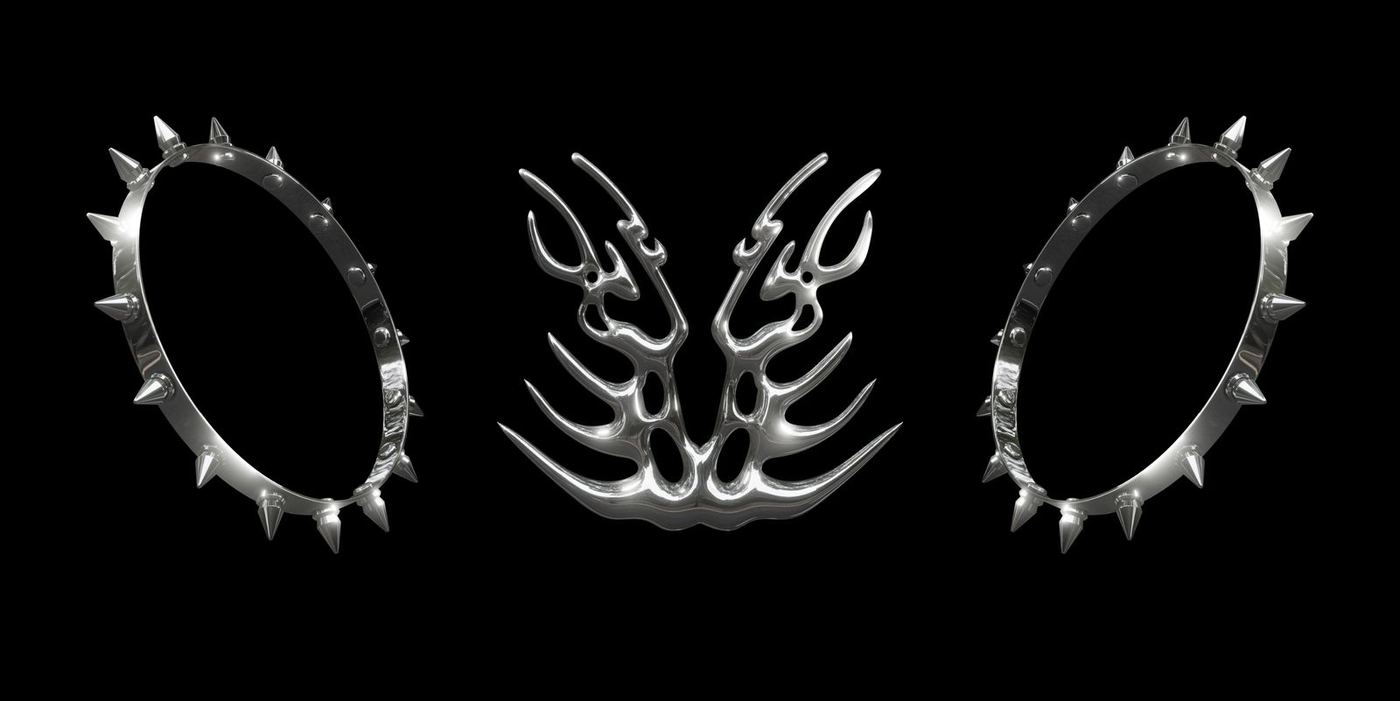 Chrome spiked rings and a winged chrome ornament