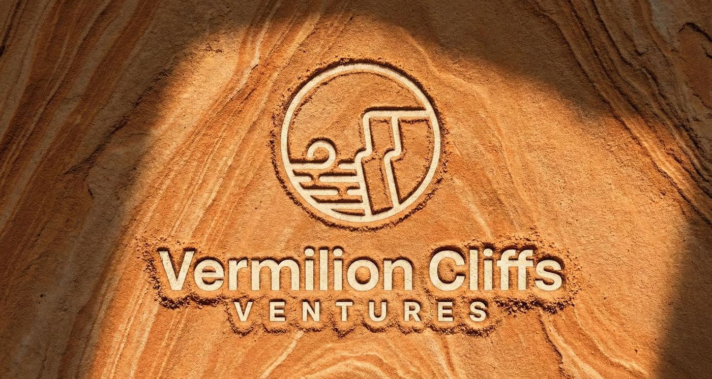 Vermilion Cliffs logo pressed into sandstone